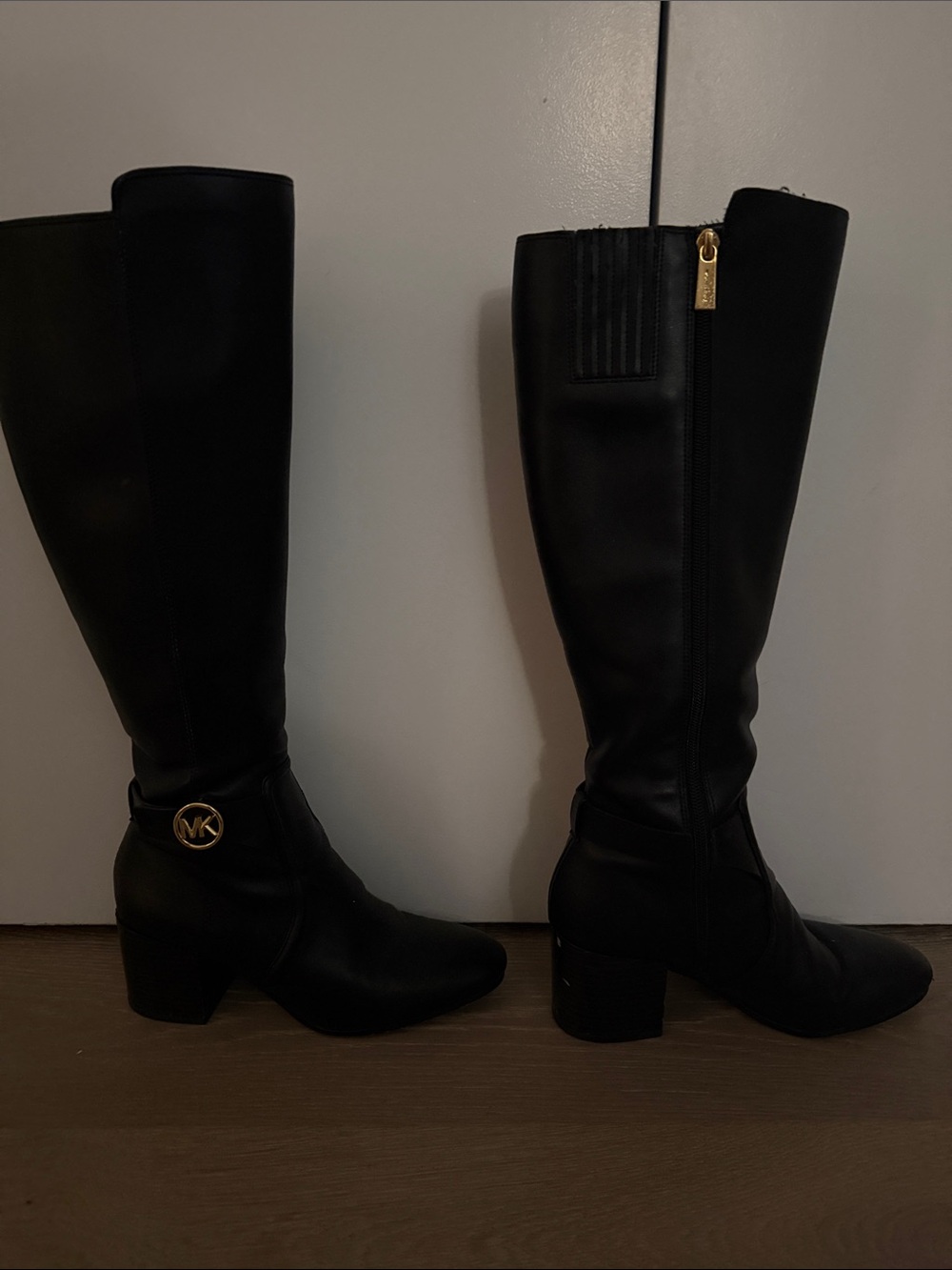 MICHAEL Michael Kors Black Knee-High Leather Boots with Gold Accents